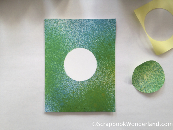 The spray is masked easily by a sticky note.