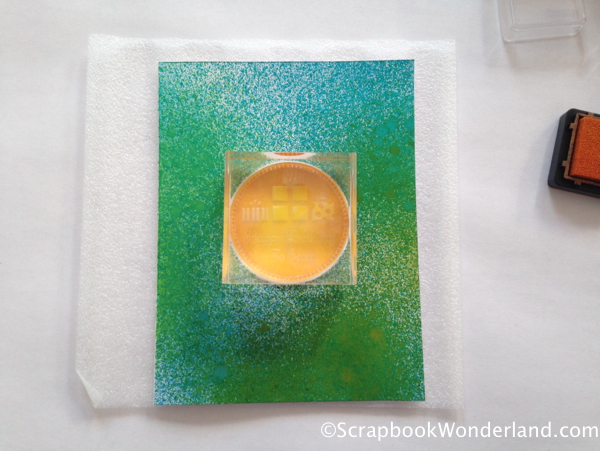 Clear stamps make adding the sentiment onto the sprayed birthday card simple.