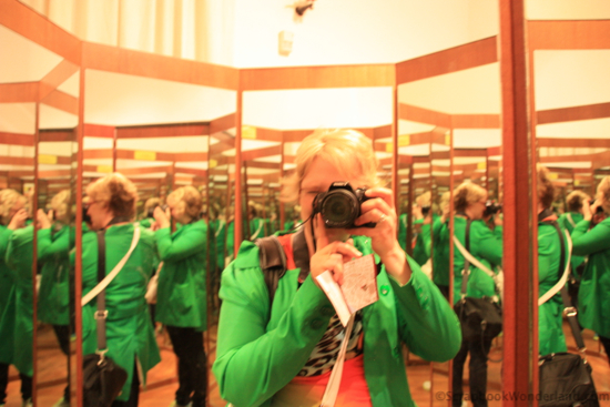 Selfie of Alice taken into a mirror with multiple reflections.