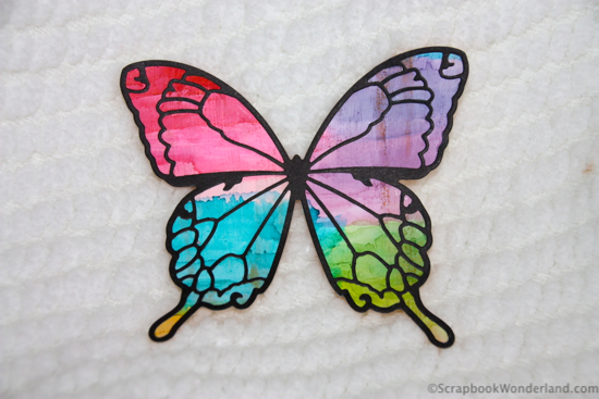 Alcohol ink butterfly cut with memory box Tristan and Chloe dies. Created by Alice Boll of https://scrapbookwonderland.com